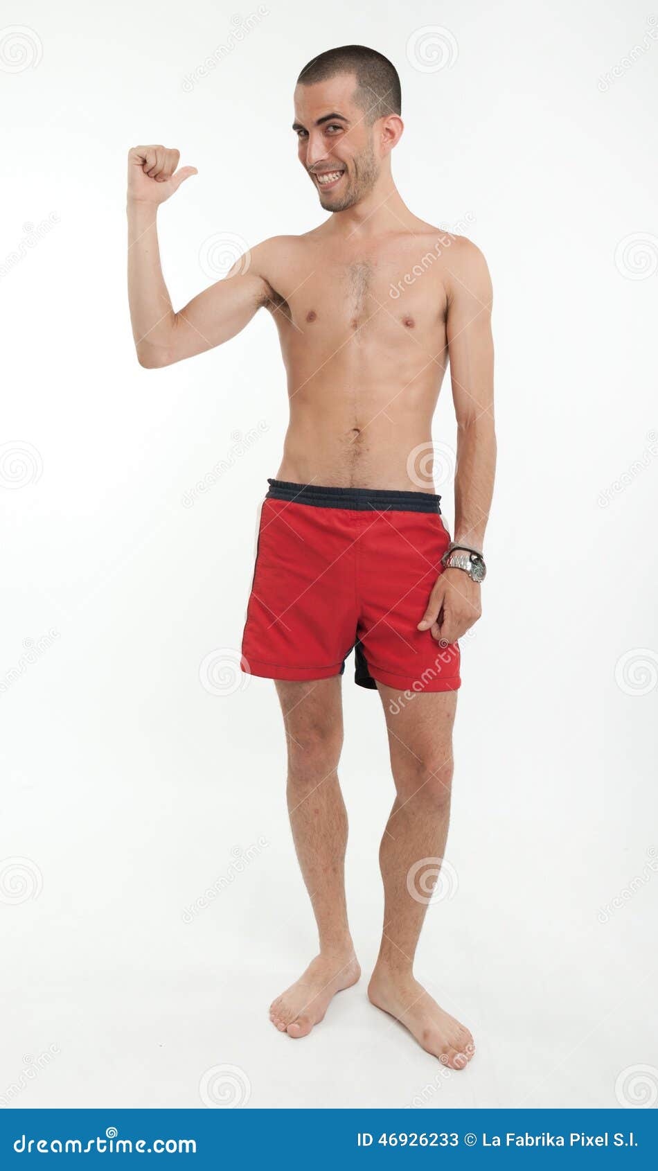 Homme Heureux Dans Des Troncs De Natation Se Dirigeant De Retour Image
