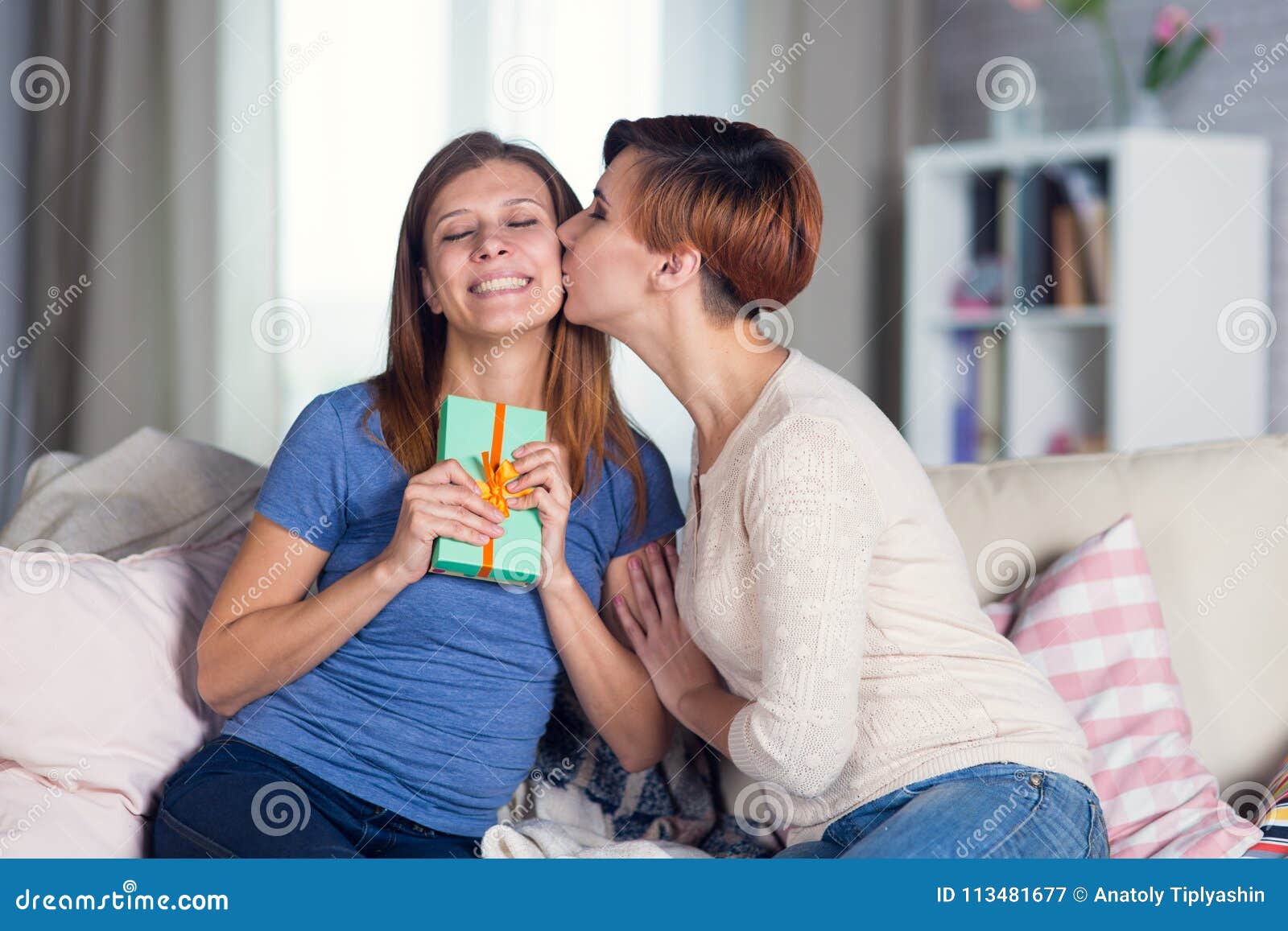 Lesbian Girls Kissing On The Sofa