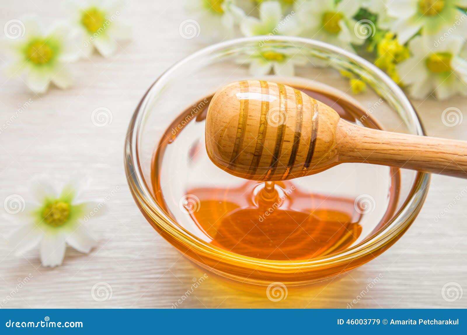 Honey dipper on glass bowl stock image. Image of ingredient 46003779
