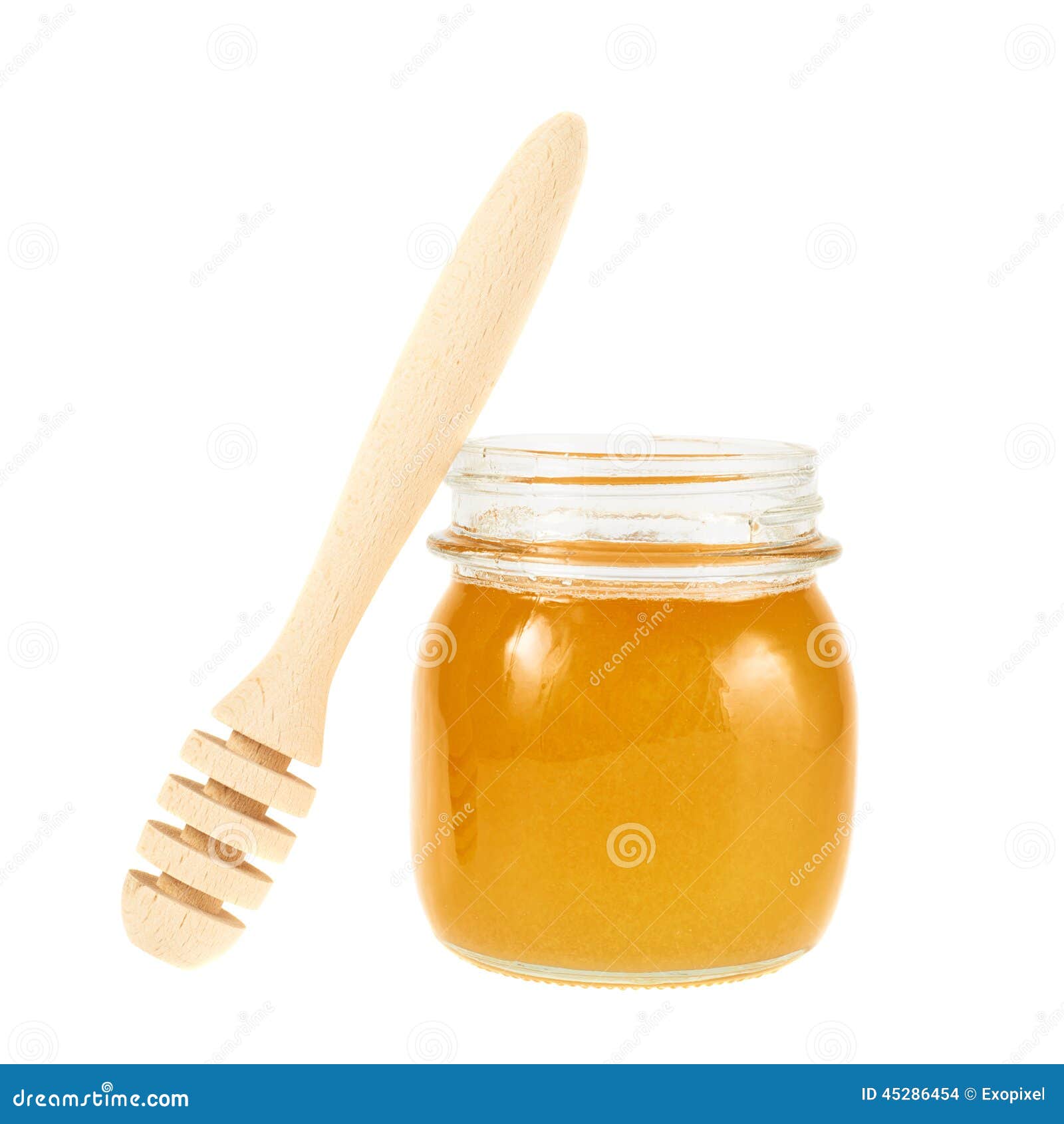 Honey dipper next to a jar stock photo. Image of close 45286454