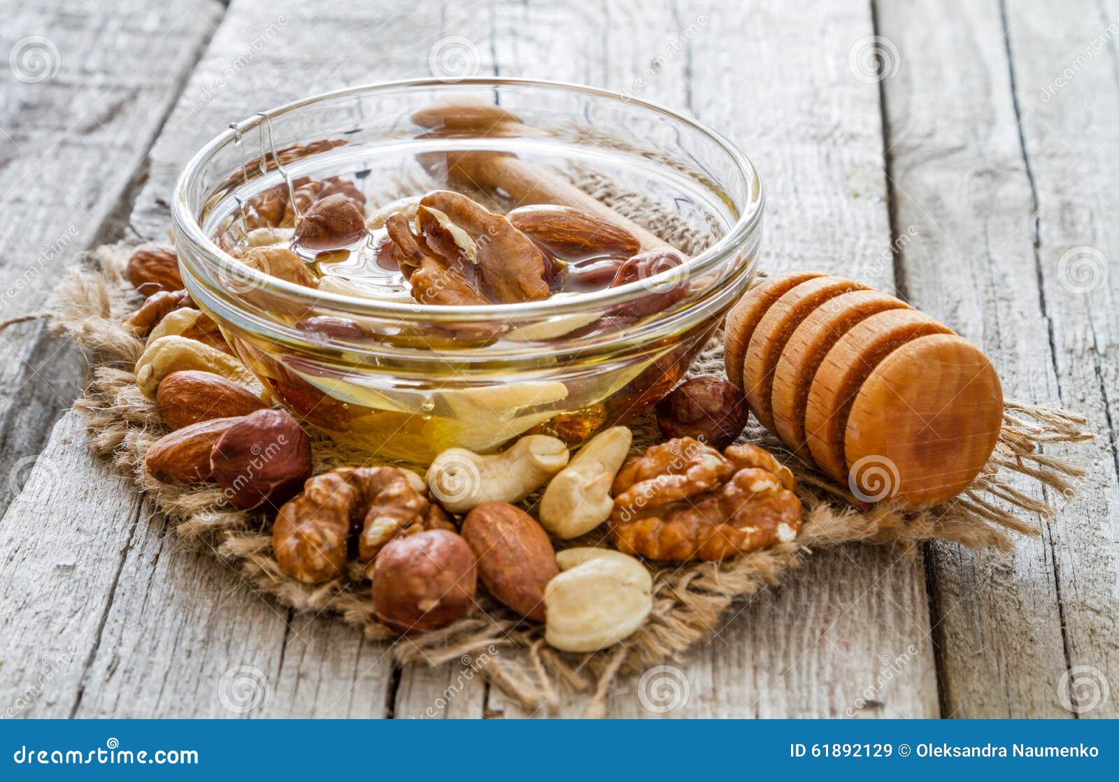 Healthy Mix Of Natural Honey With Different Nuts In A Jar On Blue Concrete  Background Stock Photo, Picture and Royalty Free Image. Image 109224603.