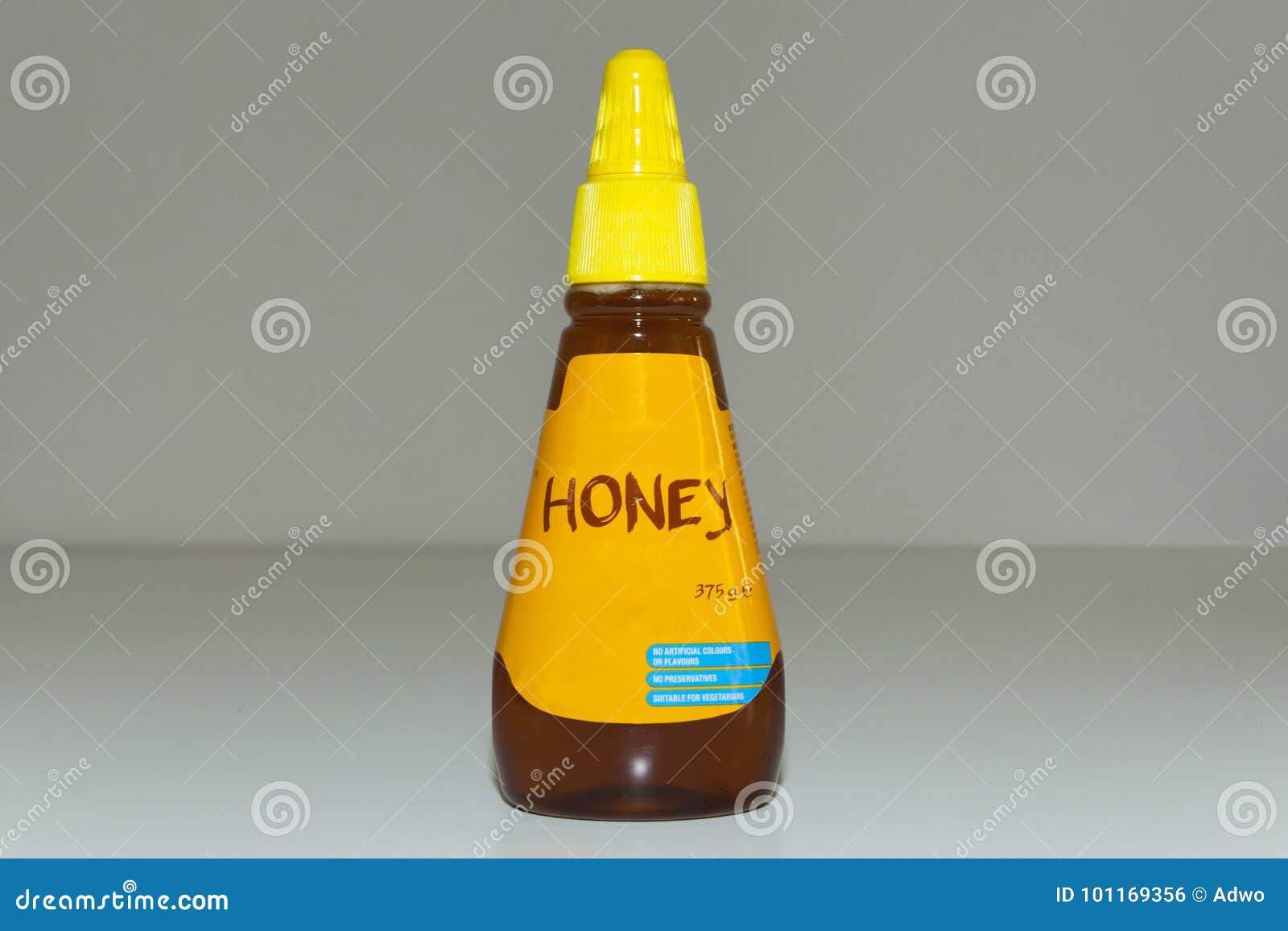 Honey Squeeze Bottle photo stock. Image du délicieux 101169356
