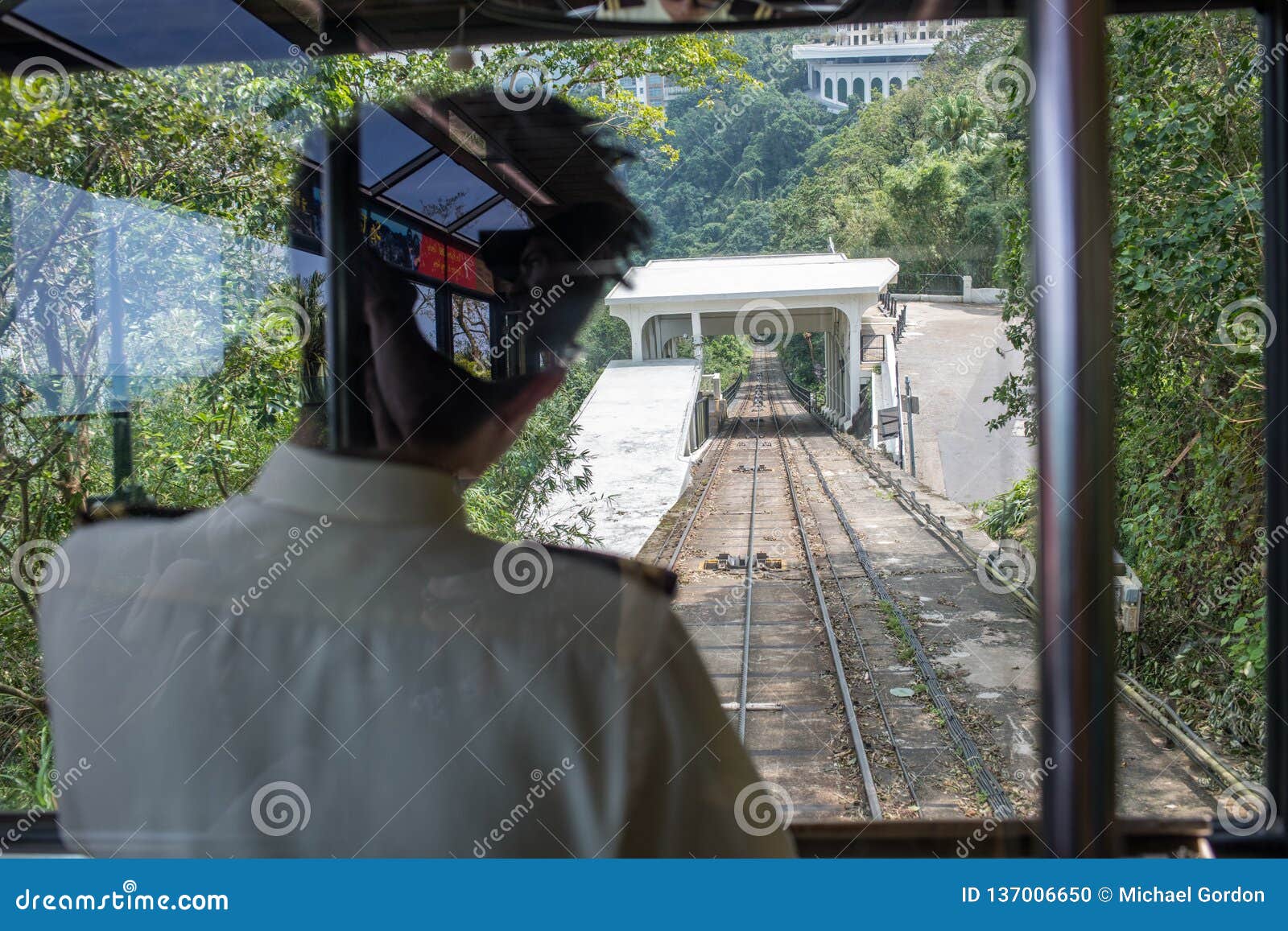 Rail Conductor on the Victoria Peak Tram Cable Car Editorial Image