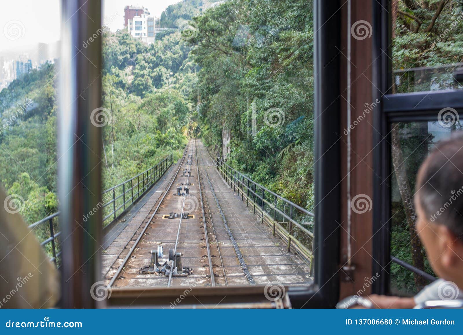 Rail Conductor on the Victoria Peak Tram Cable Car Editorial Image