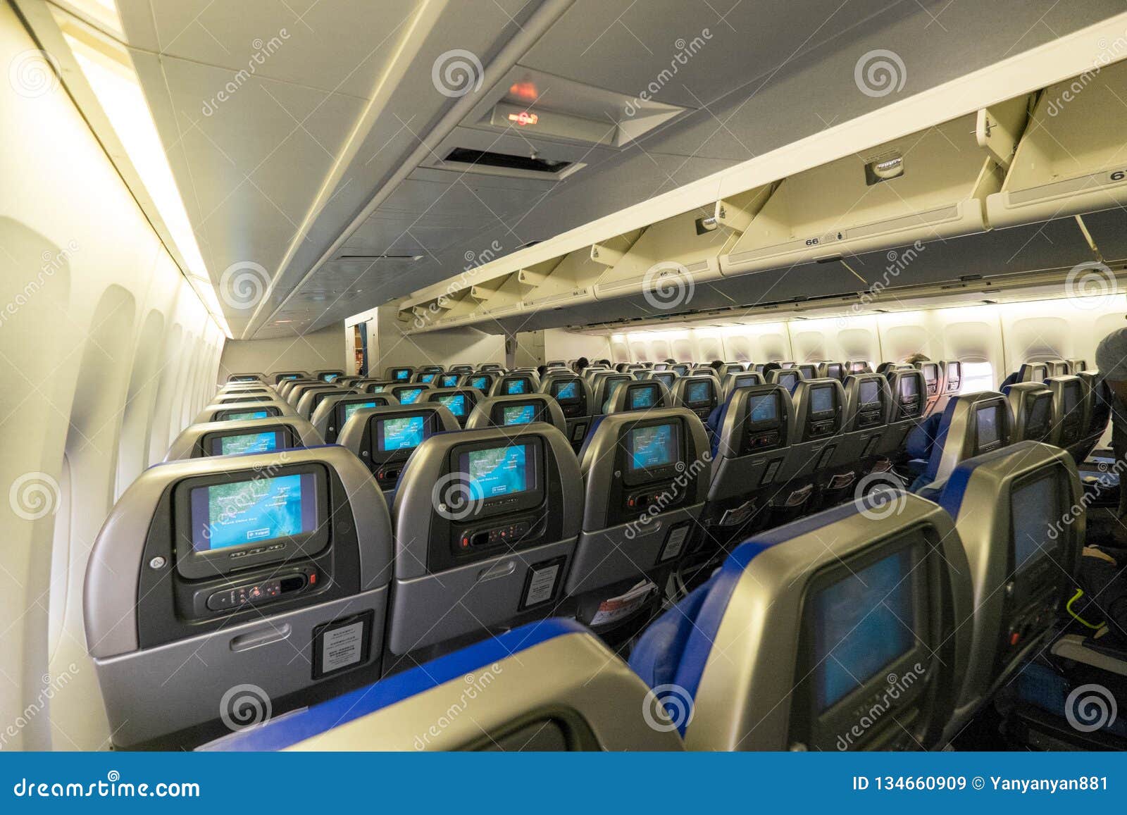 Economy Class Cabin Of Cathay Pacific Boeing 747 With Old