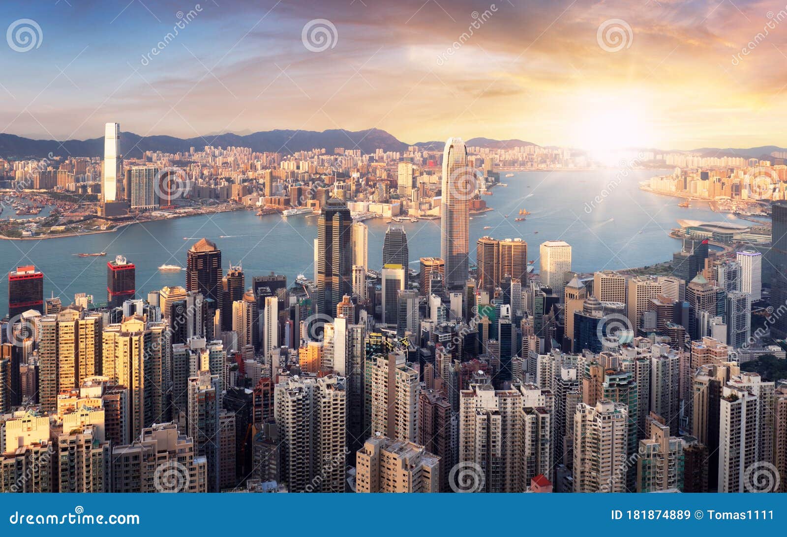 Hong Kong at Dramatic Sunset, China Skyline - Aerial View Stock Image