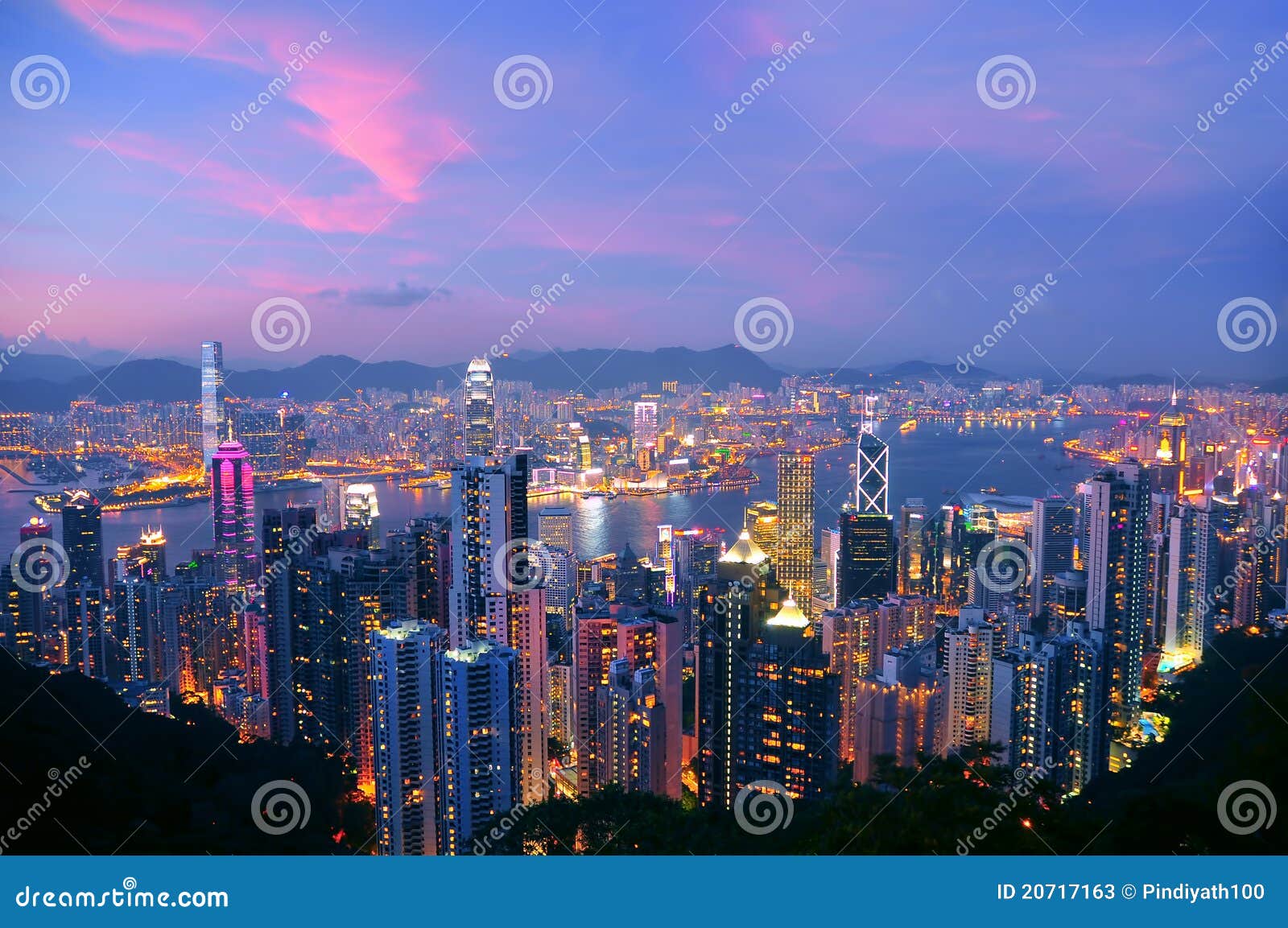 Hong kong &amp; kowloon at night. Night view of the skyscrapers of hong kong and kowloon islands from victoria peak