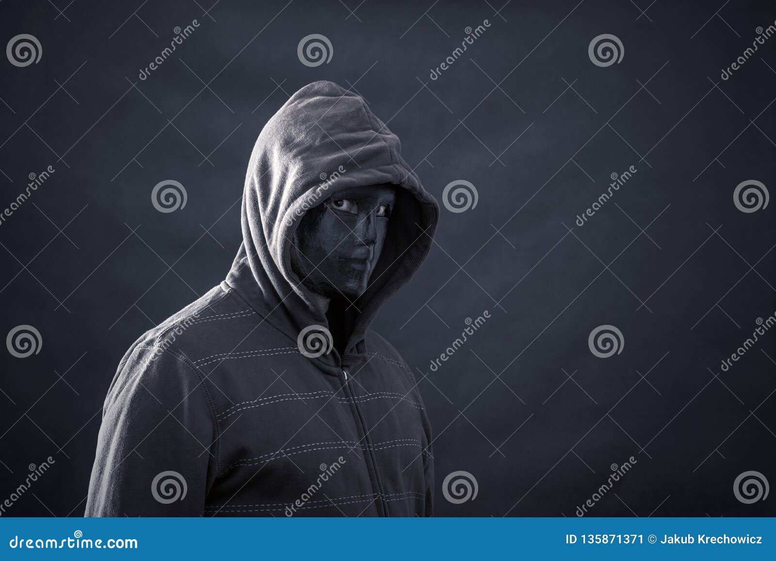 Hooded man with black mask stock image. Image of dangerous - 135871371