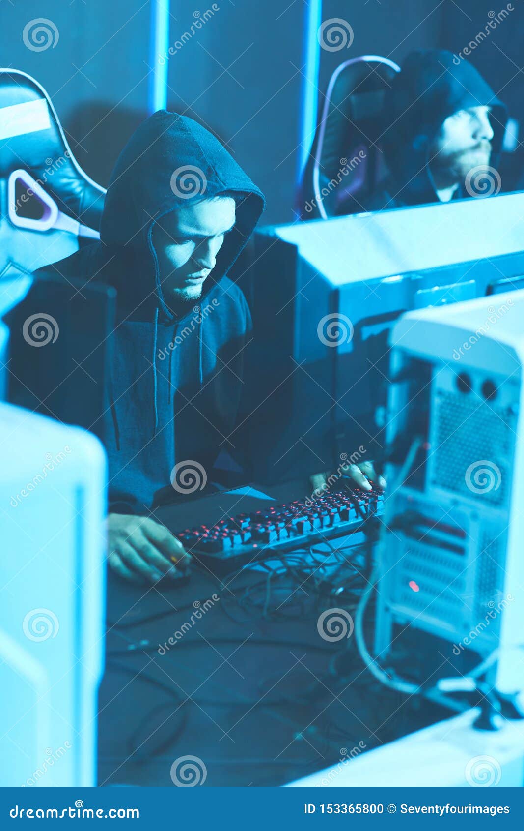 Hooded Programmers Using Powerful Computers Stock Photo Image of