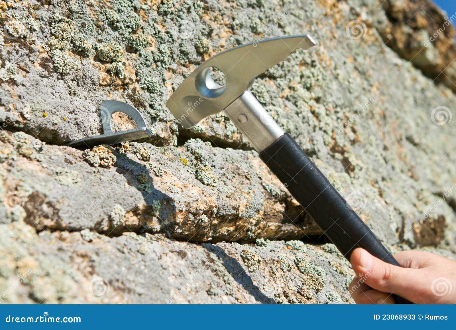 In Hook Hammer into Crack of Rock Hammer Stock Image Image of hand