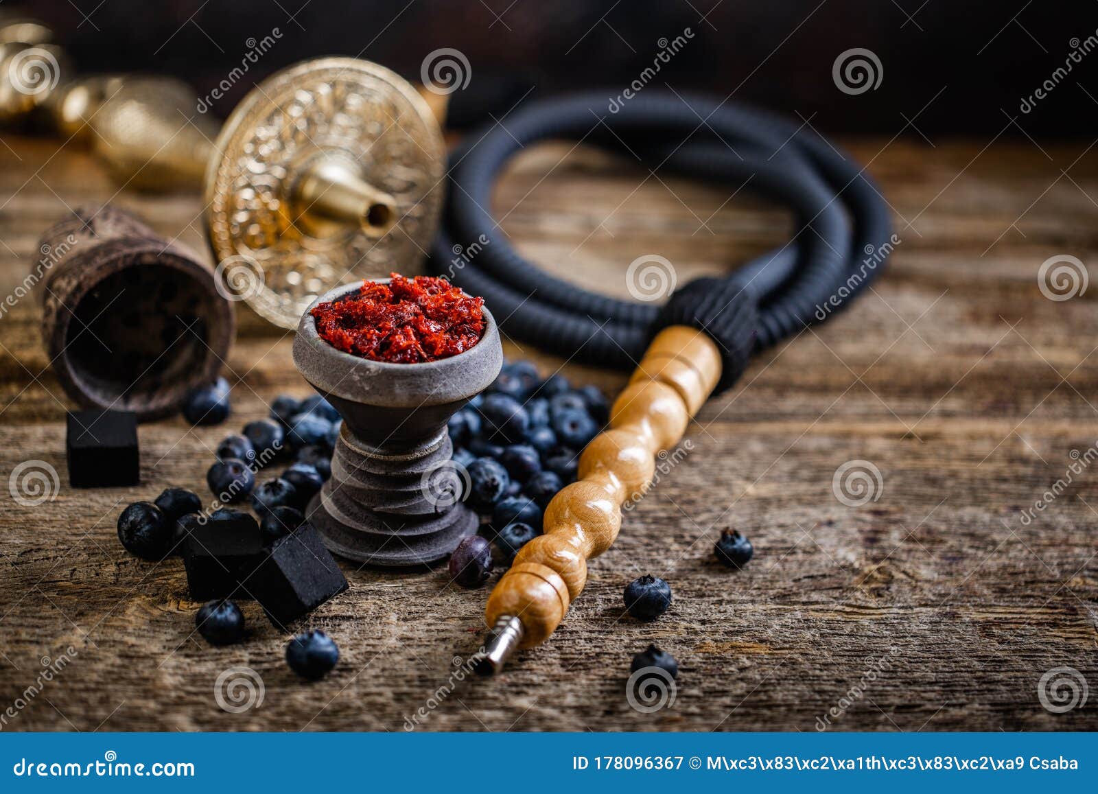 Hookah Head on Old Table with Fruit Flavoured Tobacco Stock Image