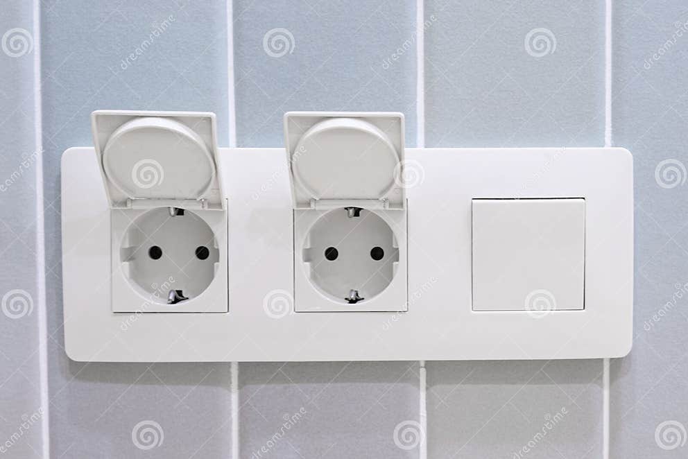 Horizontal Block of Two Sockets and a Switch. Bathroom Socket