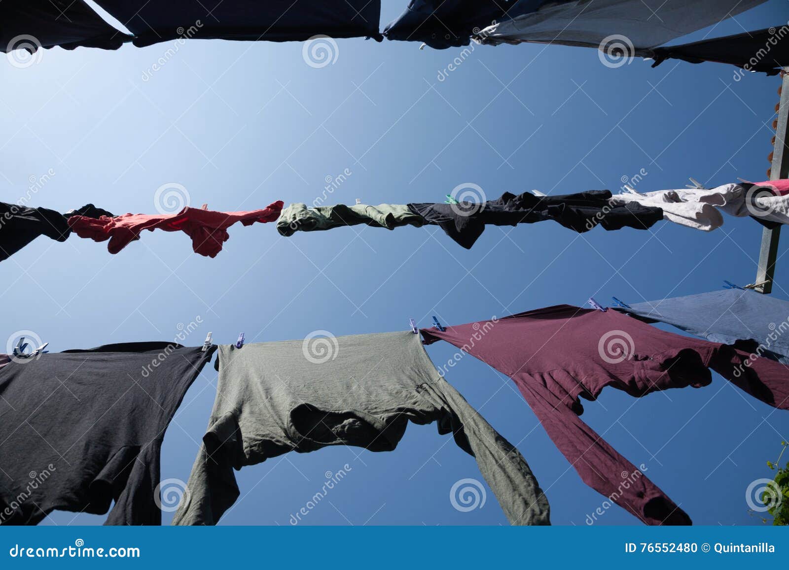 Horizontal Low View of Shirts Hanging in Clothesline Stock Photo ...