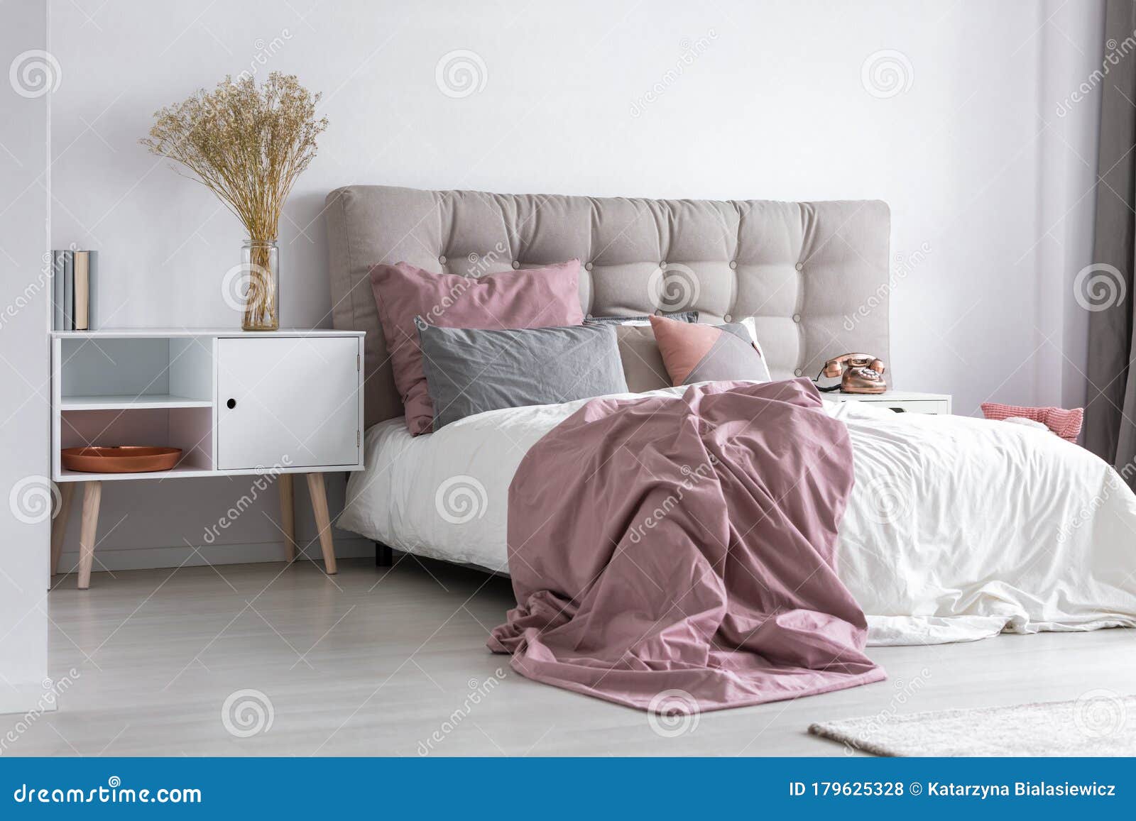 pastel pink cozy bedroom with grey accents