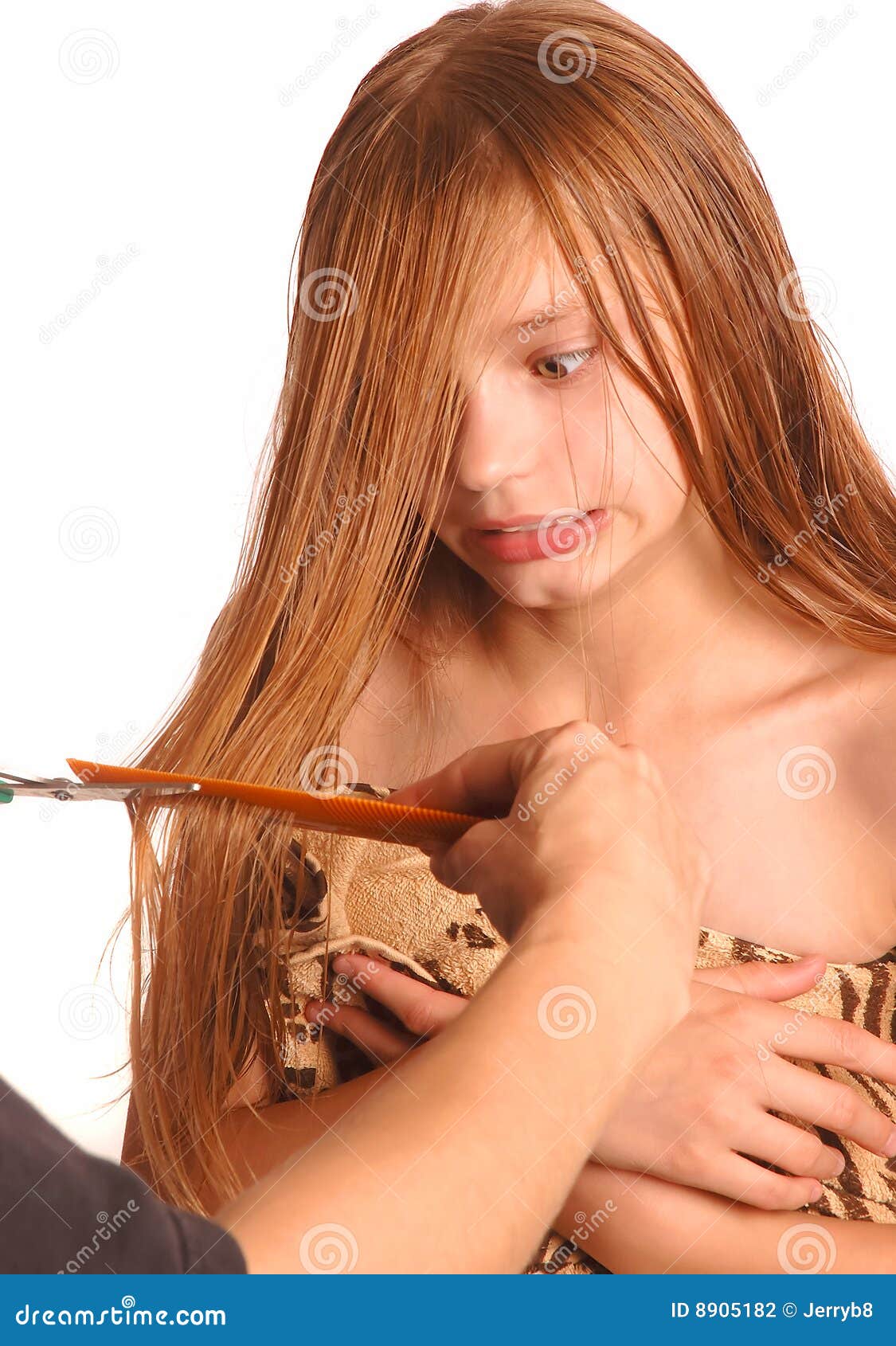 horrified girl having hair cut