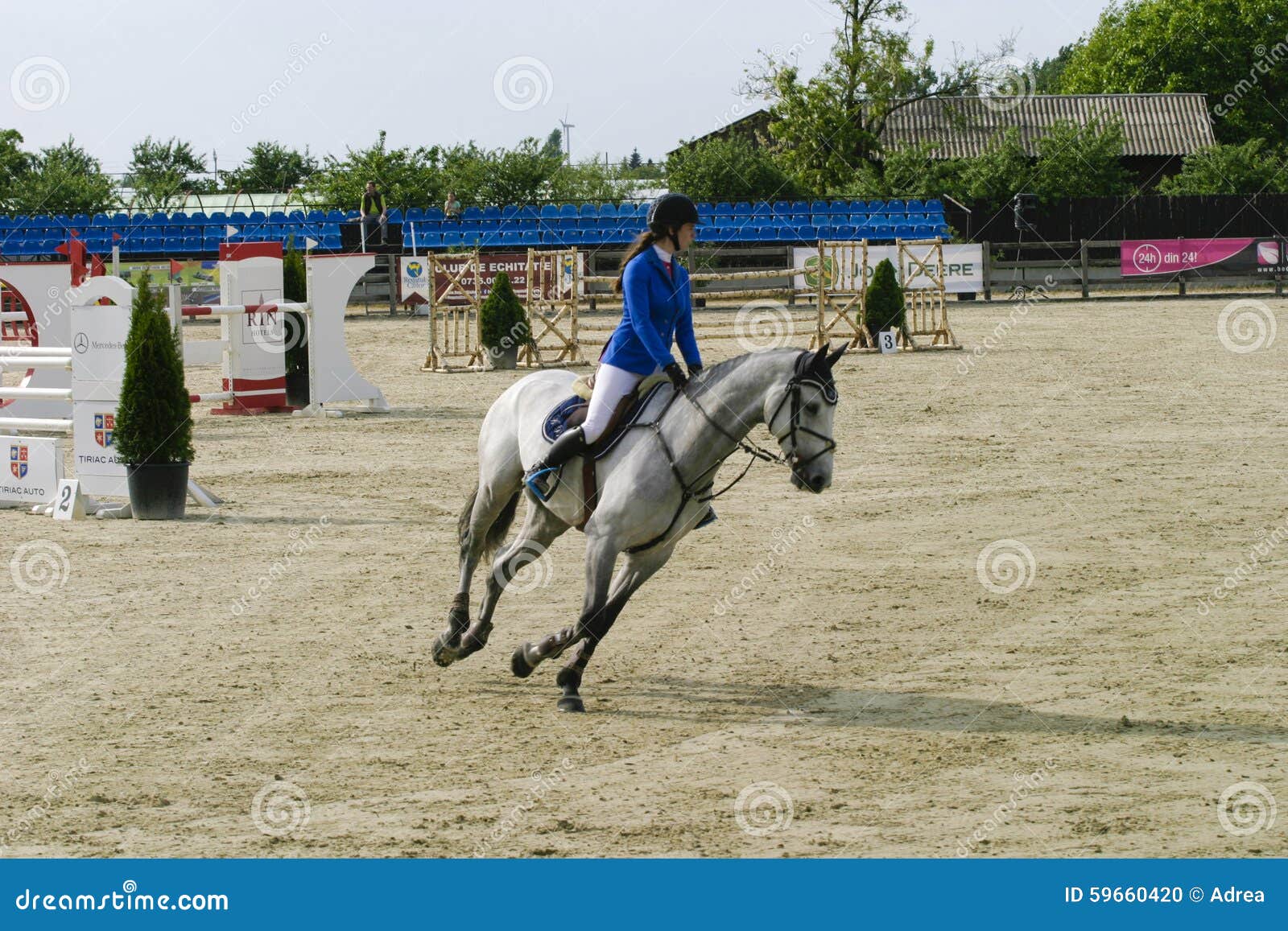Equitation Contest, Horse Jumping Over Obstacle Editorial Image Image