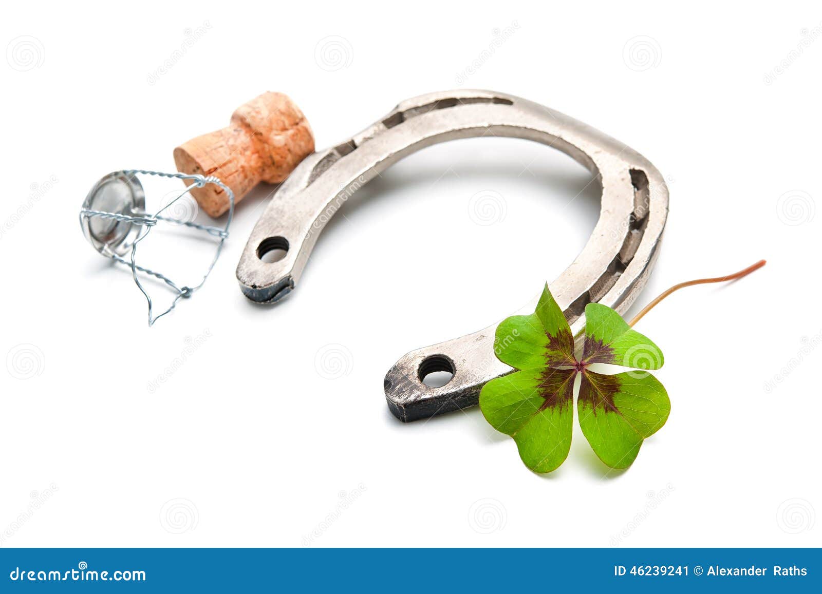 Horseshoe and Champagne Cork with a Four Leaf Clover Stock Image