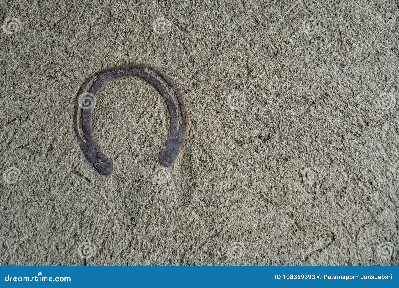 Horseshoe on Concrete Floor Stock Image - Image of brown, farm: 108359393