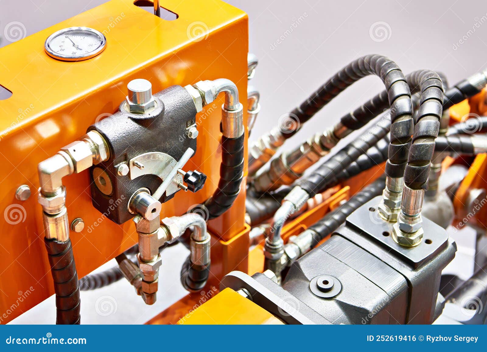 Hoses of hydraulic machine stock photo. Image of orange 252619416