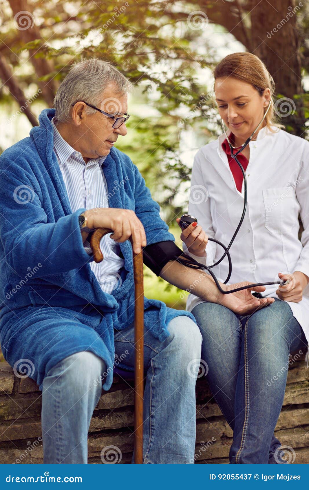 hospitals, labs and clinics- assessment of blood pressure elderly man.