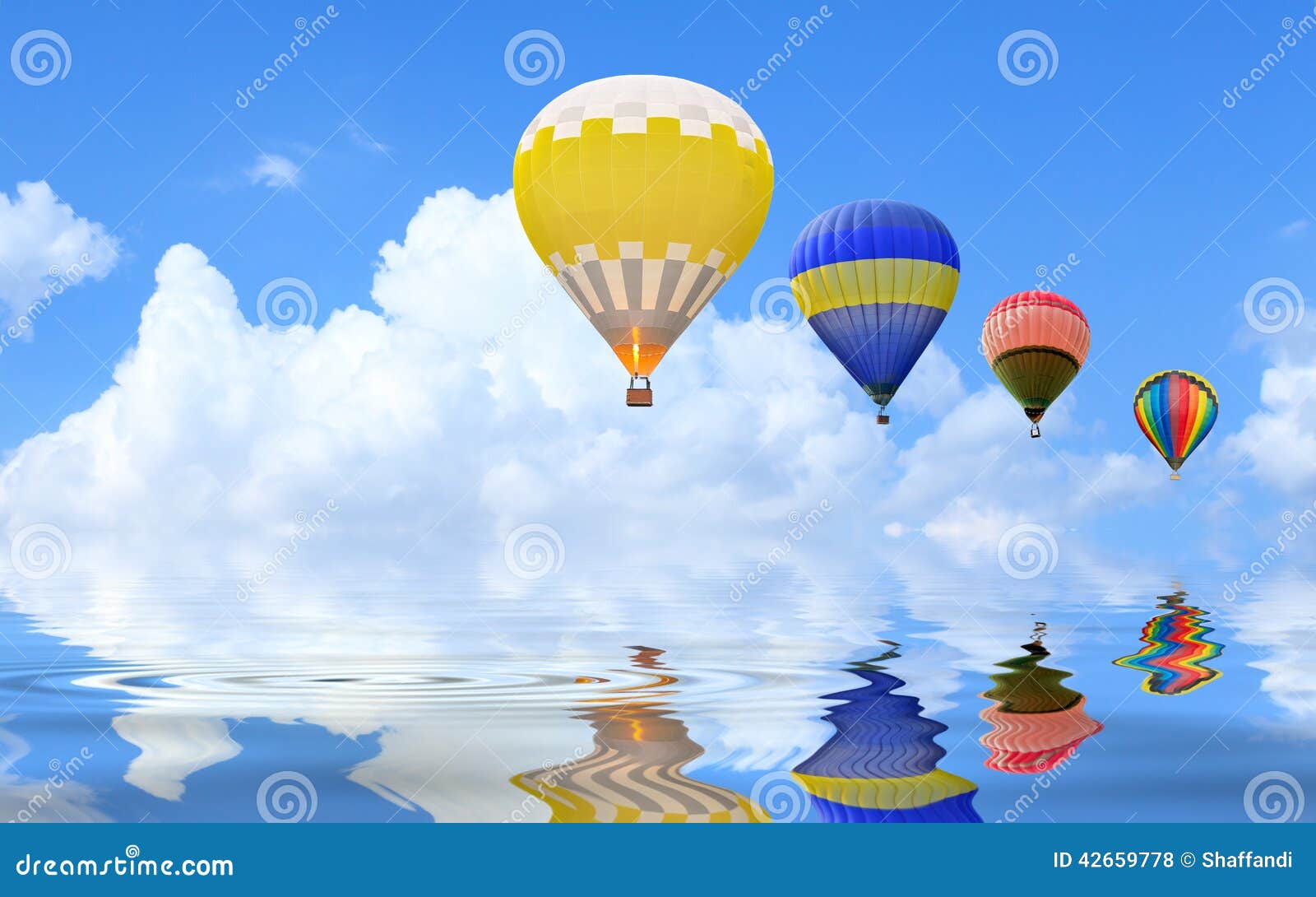 Hot Air Balloon Floating In The Sky Over Land RoyaltyFree Stock Image
