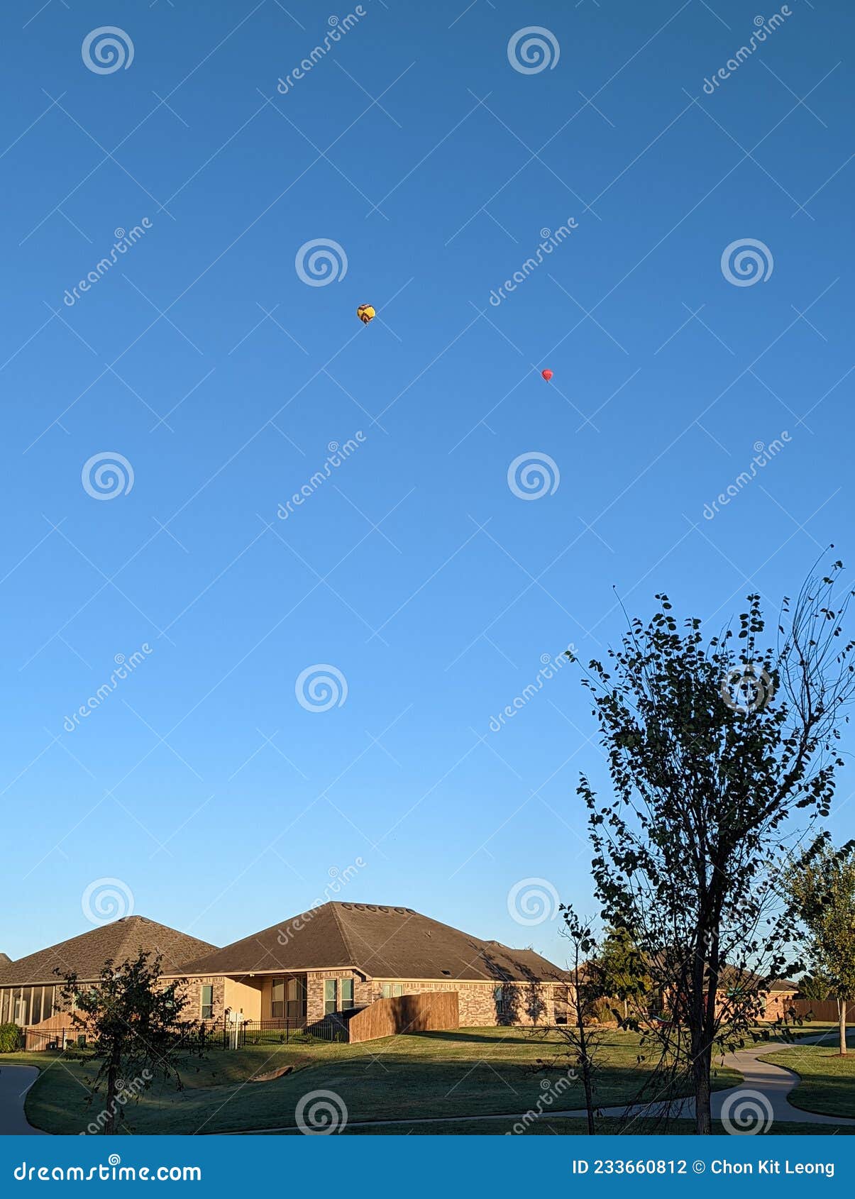 Hot Air Balloon Flying Over a Community Stock Photo Image of edmond