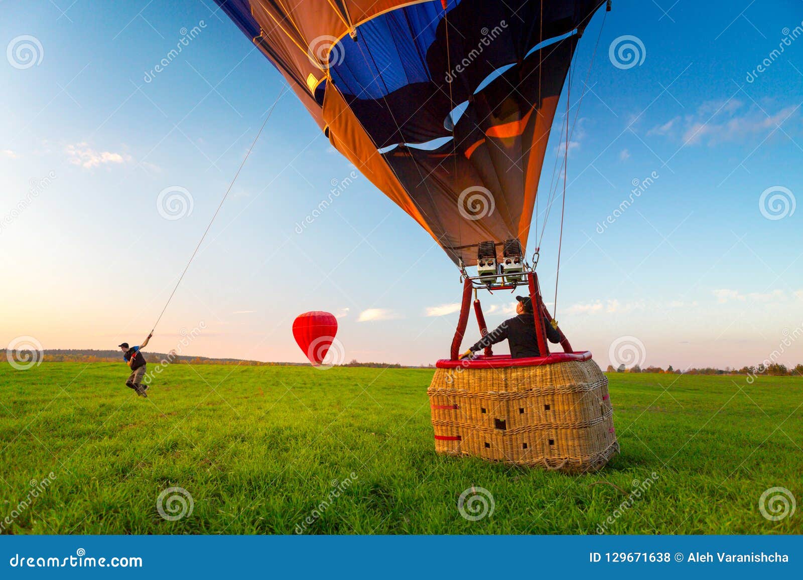 Hot Air Balloon Landing stock photo. Image of aeronautical 129671638