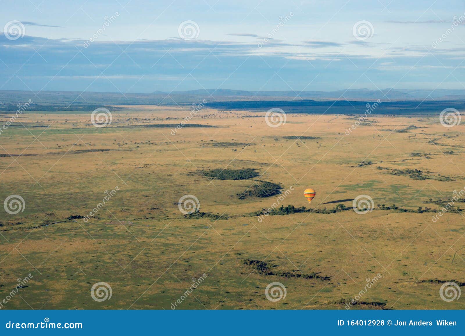 hot air balloon ride on the big green plains of masai mara in kenya/africa.