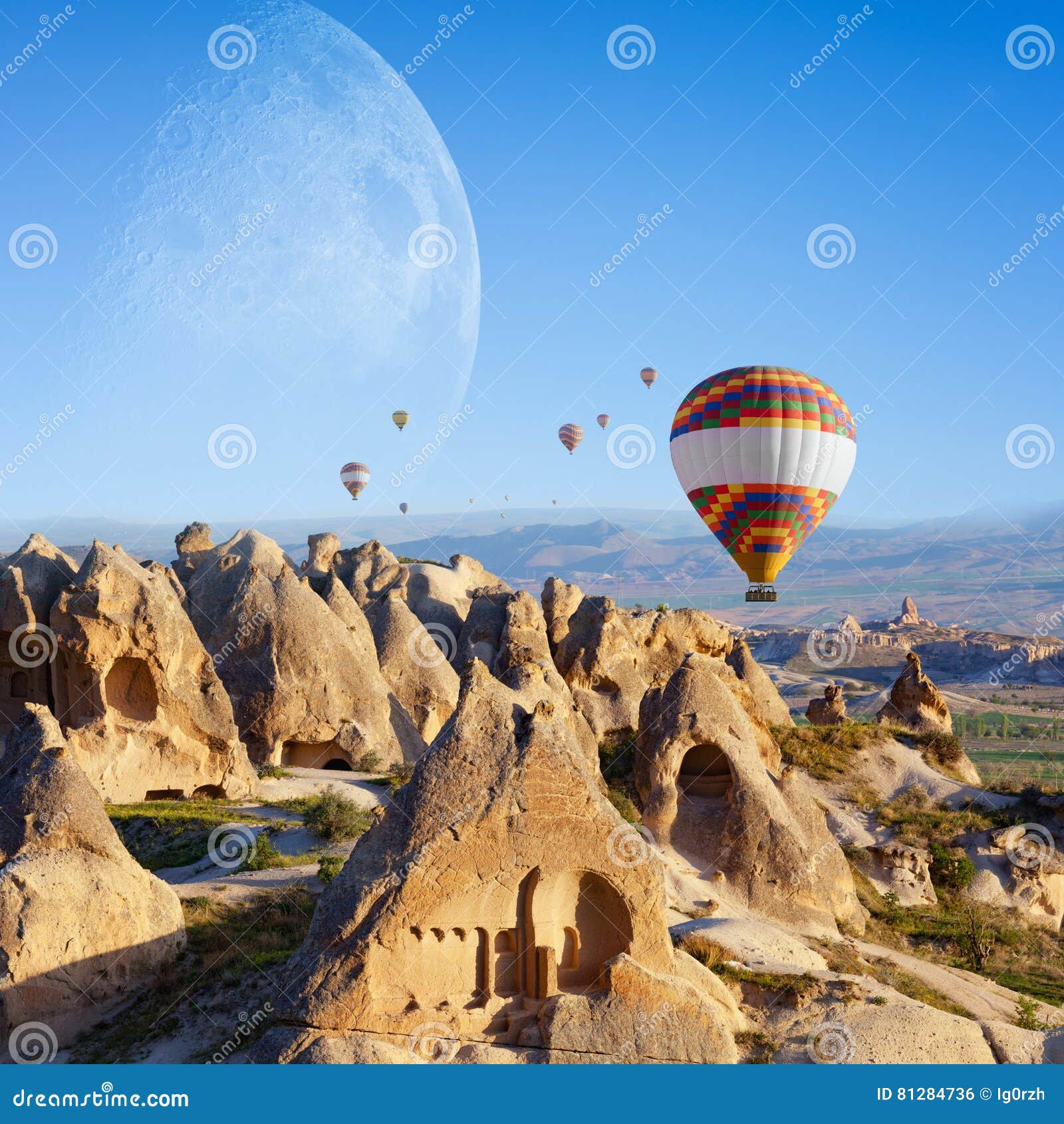 hot air ballooning in sunrise in cappadocia, turkey