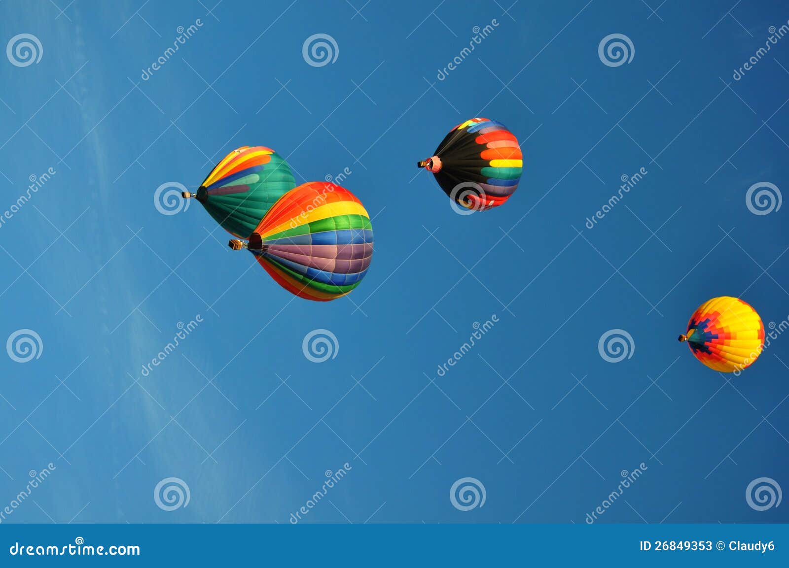 Hot Air Balloons. Colorful Hot air balloon ascending under bright blue skies