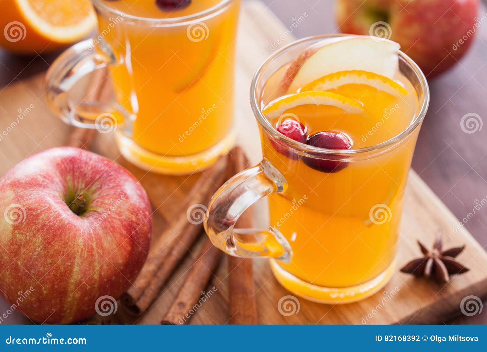 Hot Apple Orange Cider with Cinnamon Spice Warming Drink Stock Photo