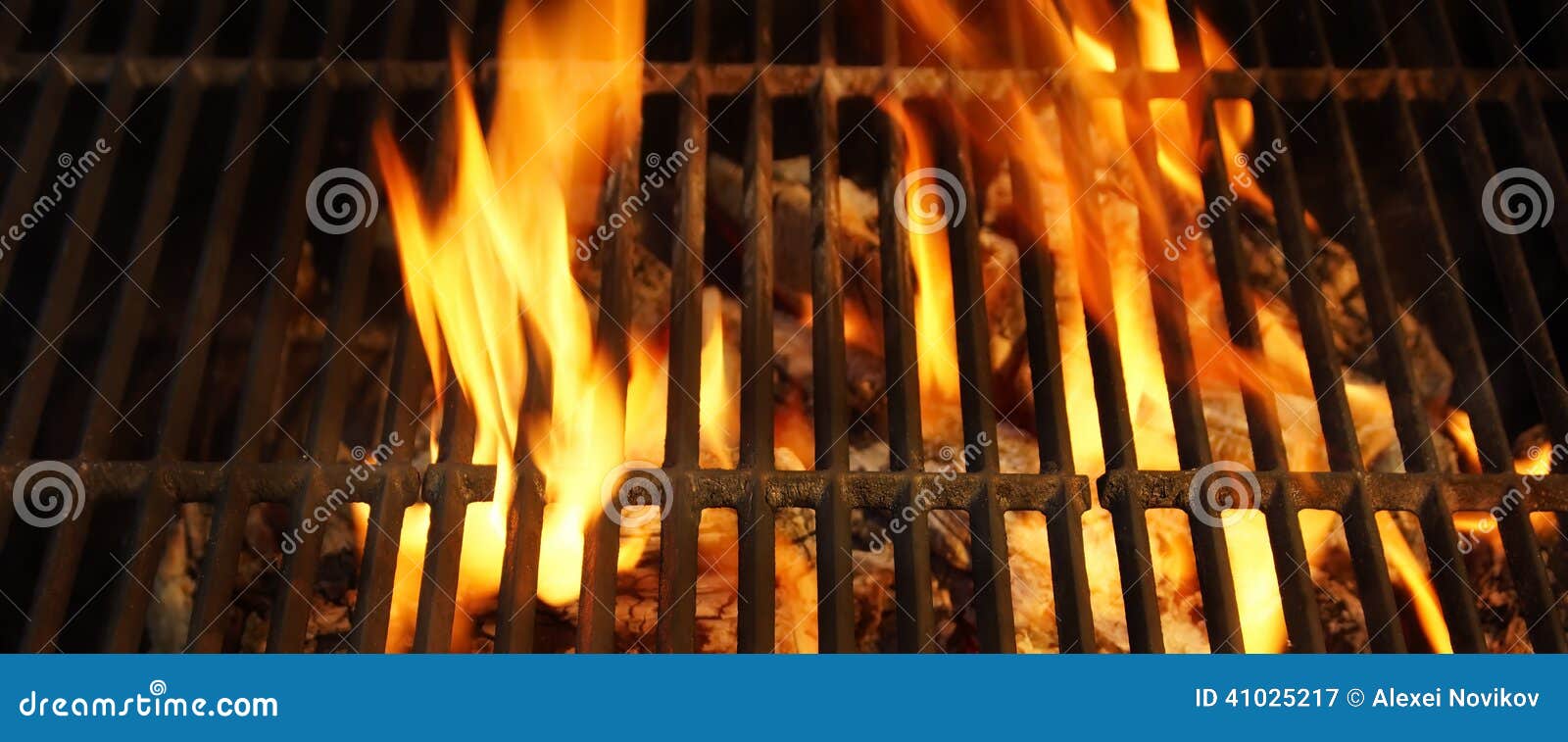 hot bbq grill, bright flames and burning coals.