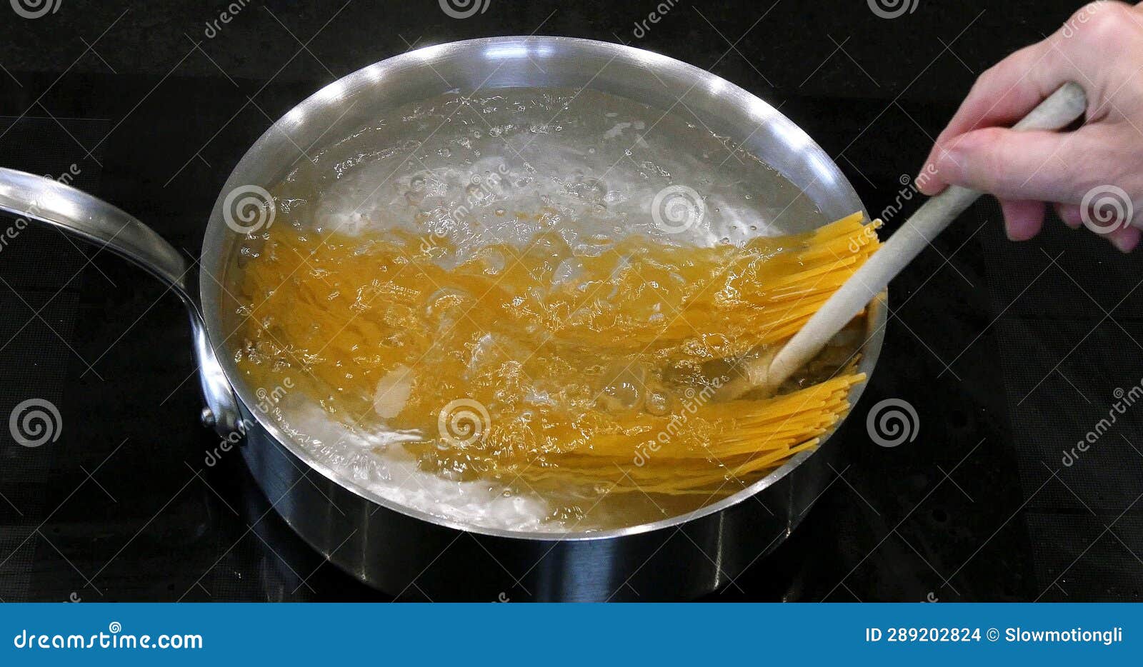 Hot Boiling Water and Spaghetti Pasta in a Saucepan Stock Photo Image