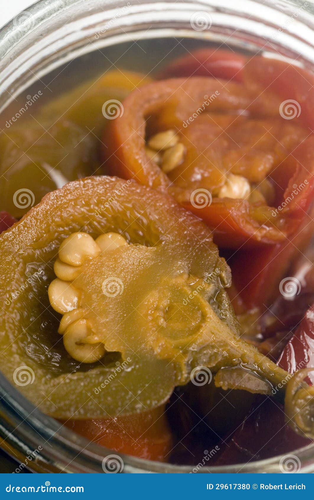 Hot Cherry Peppers Red and Green Appetizer Glass Jar Stock Photo