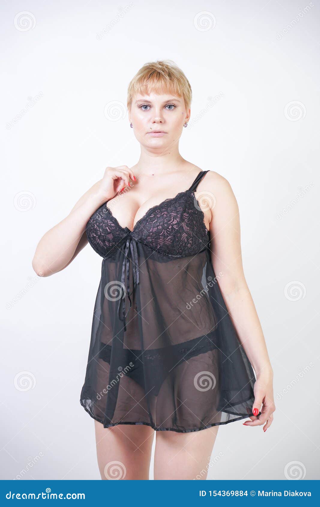 Hot Chubby Woman Wearing Lingerie Transparent Black Dress Stock