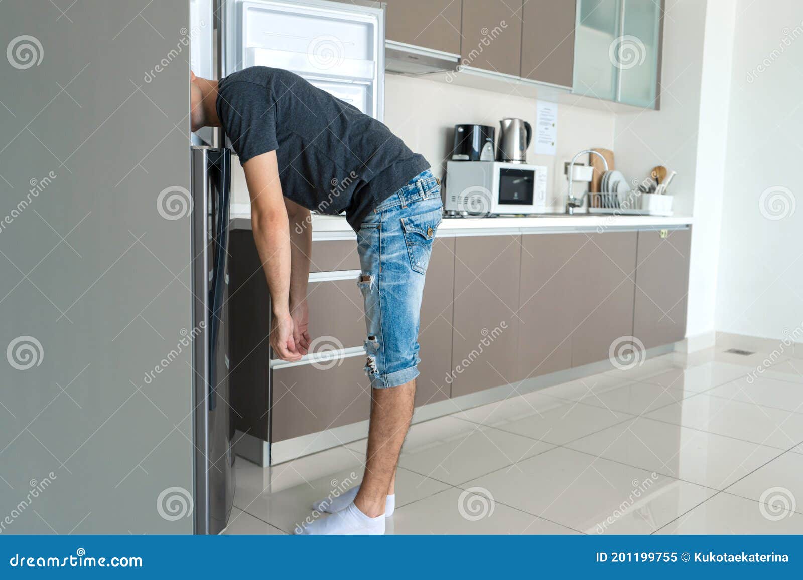 On a Hot Day, the Guy Cools with His Head in the Refrigerator. Broken