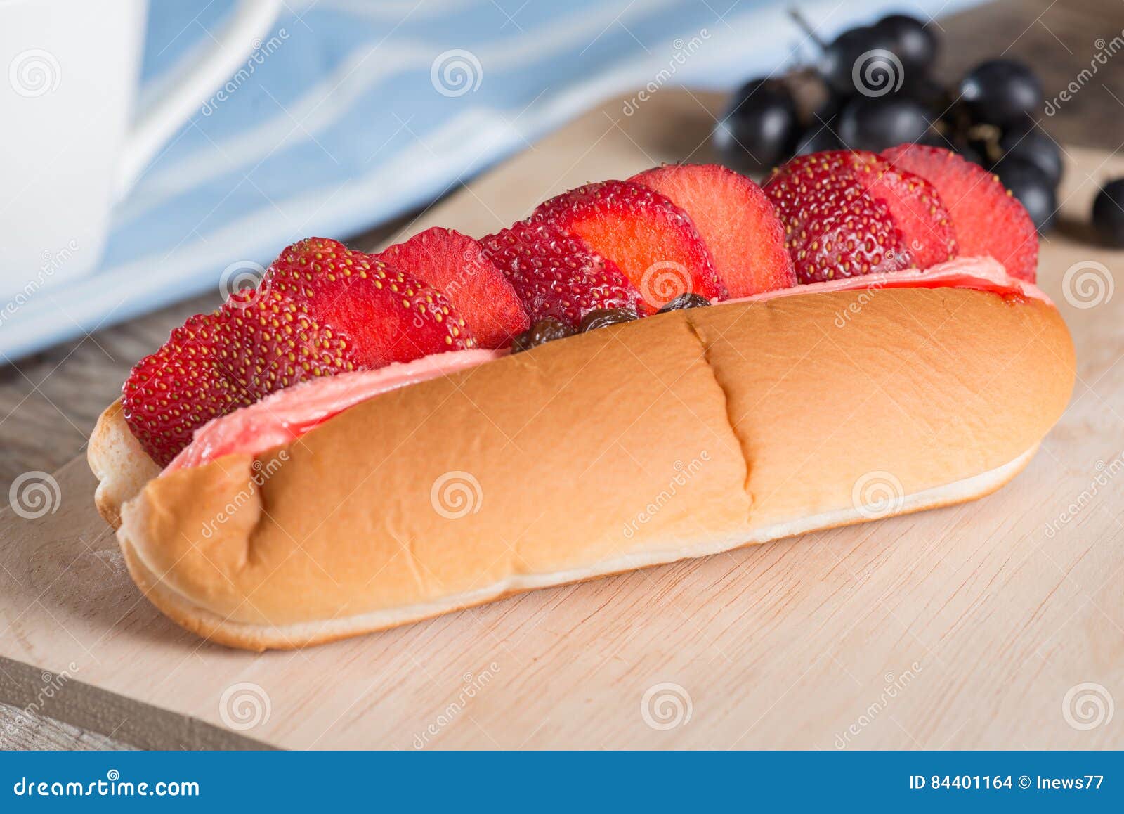 Hot Dog Bun with Strawberry Slice and Cream. Stock Photo Image of