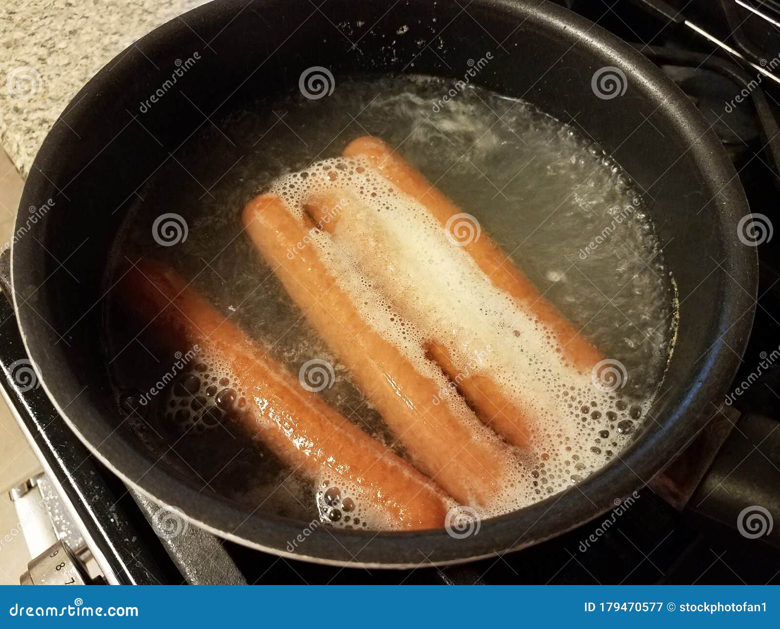 Hot Dogs Boiling in Water in Pan on Stove Stock Image Image of meat