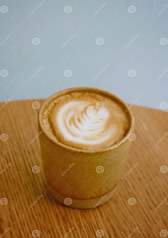 Hot Flat White with Art Design on White Background Stock Photo Image