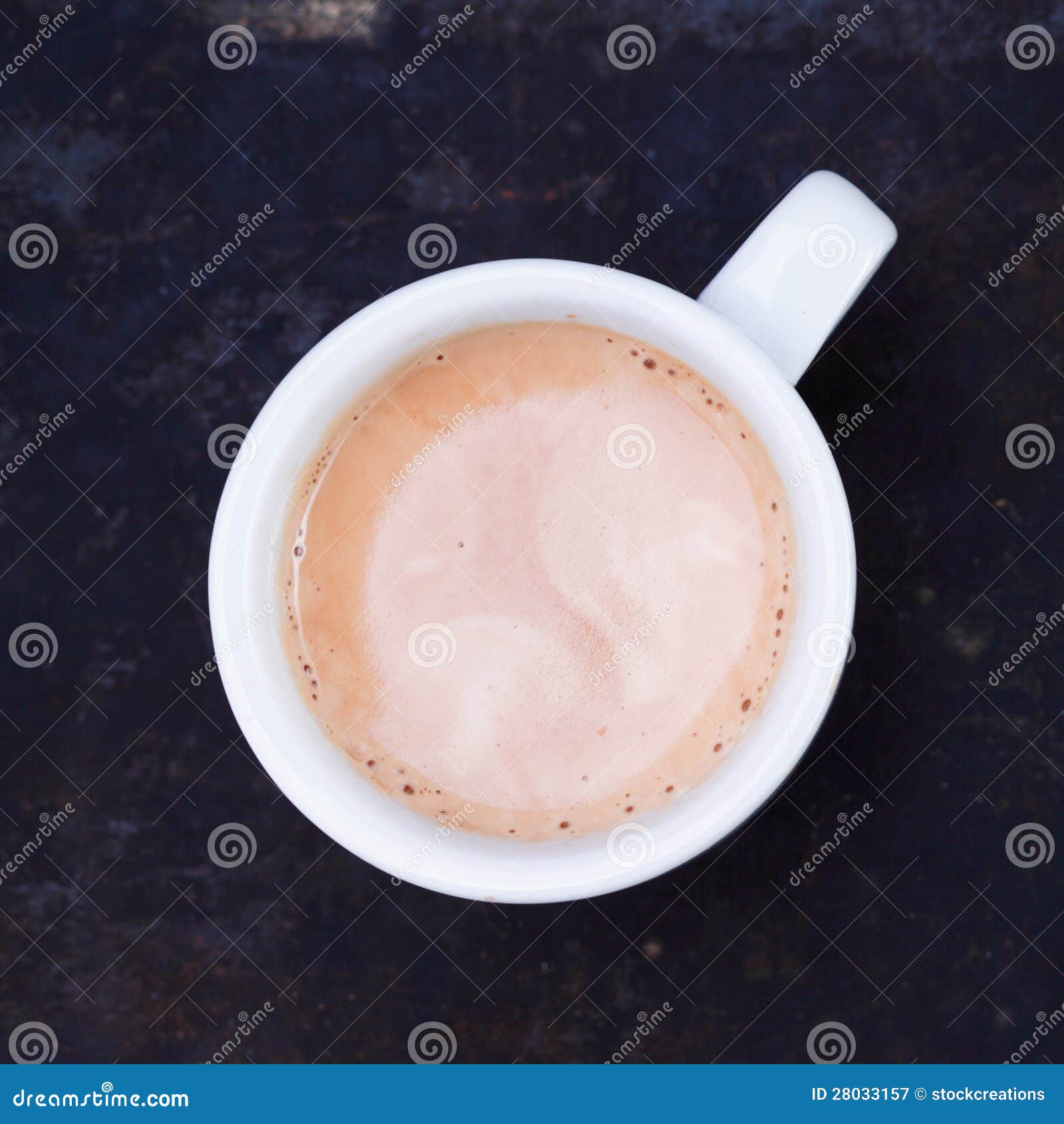 hot frothy cup of cappuccino or cafe au lait