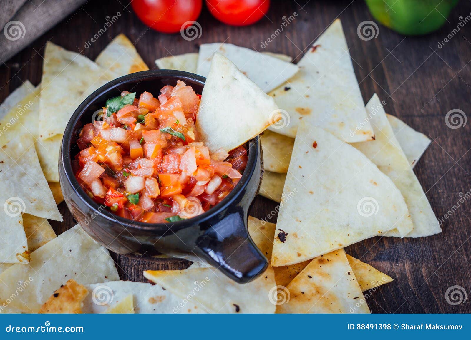 Hot Mexican Salsa Spicy Dip with Nachos Chips from Corn Stock Photo