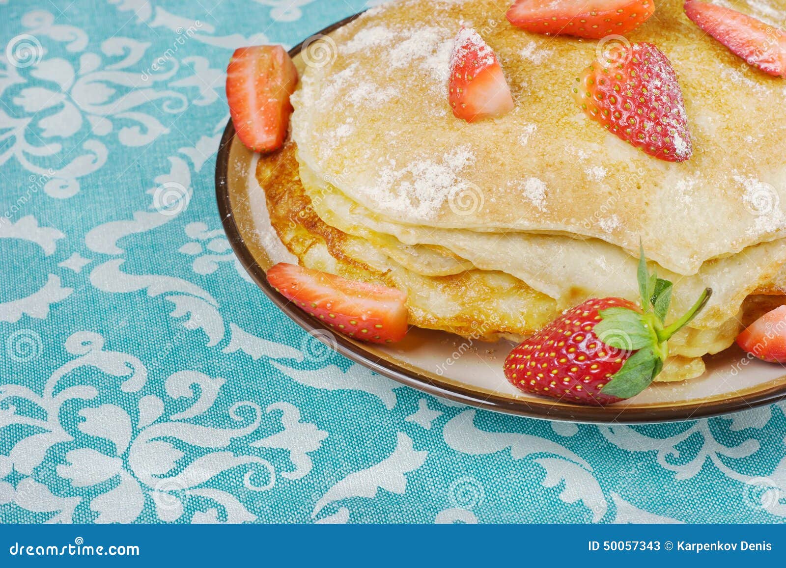 Hot Pancakes with Strawberries and Honey on the Ceramic Plate Stock