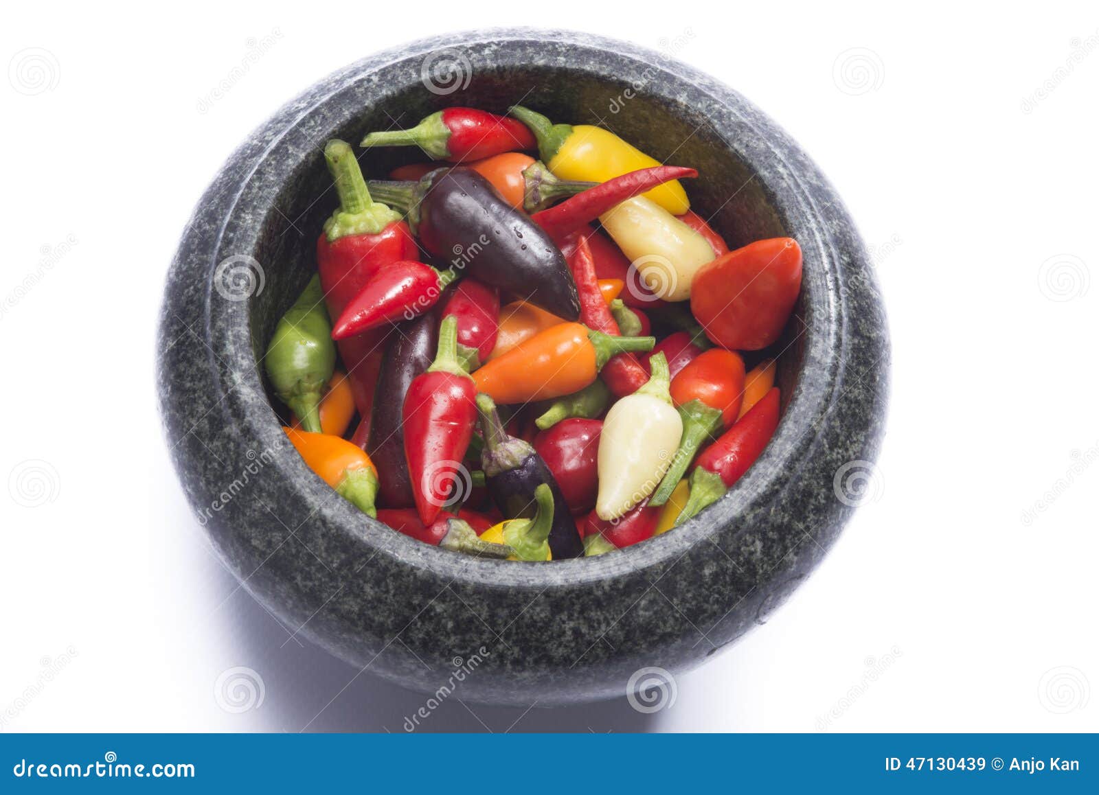 Hot pepper mix in mortar stock image. Image of orange 47130439