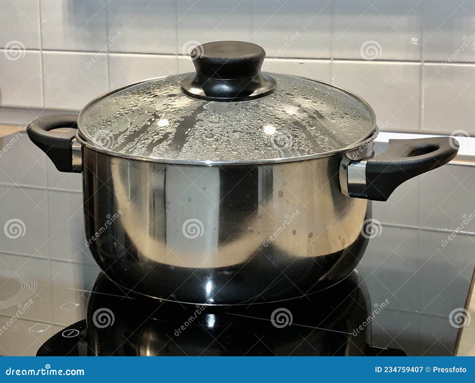 Pot with a Lid on the Induction Cooktop Stock Image Image of metal