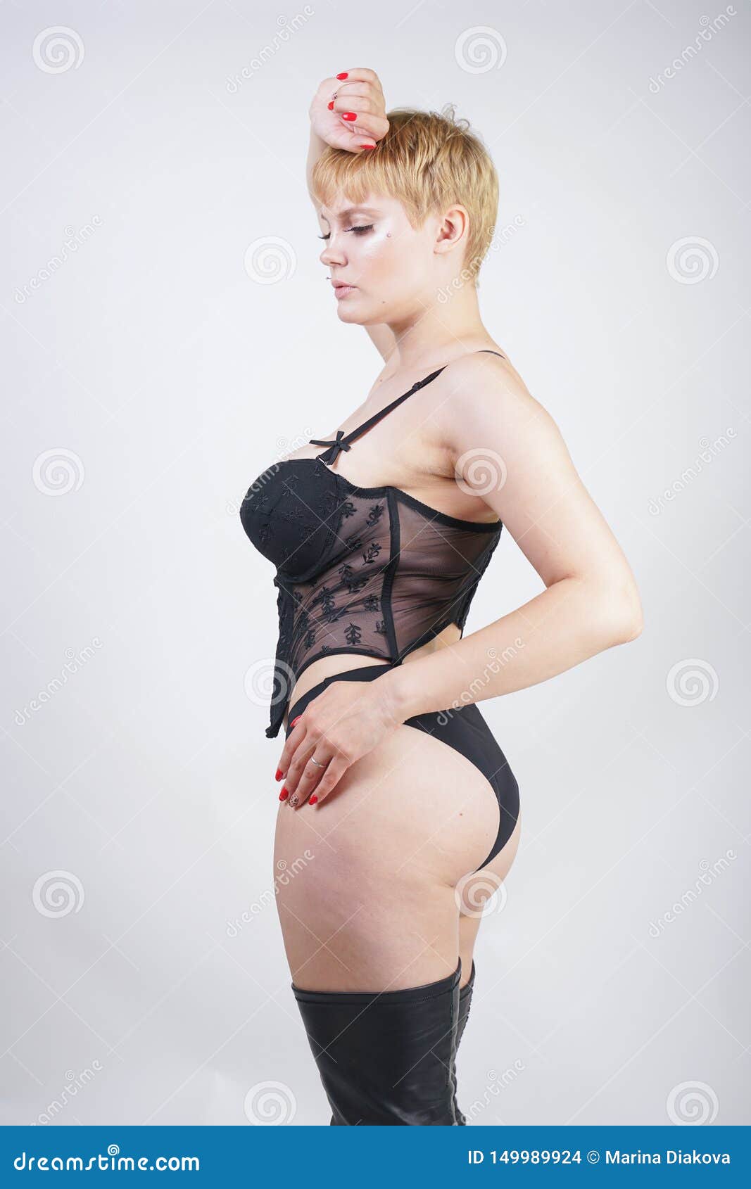 Hot Sexual Young Blonde Woman Short Hair Wearing Fashion Lace Bodice Underwear with Leather Thigh High Platform Boots on Stock Photo - Image of dominatrix, bodice: 149989924