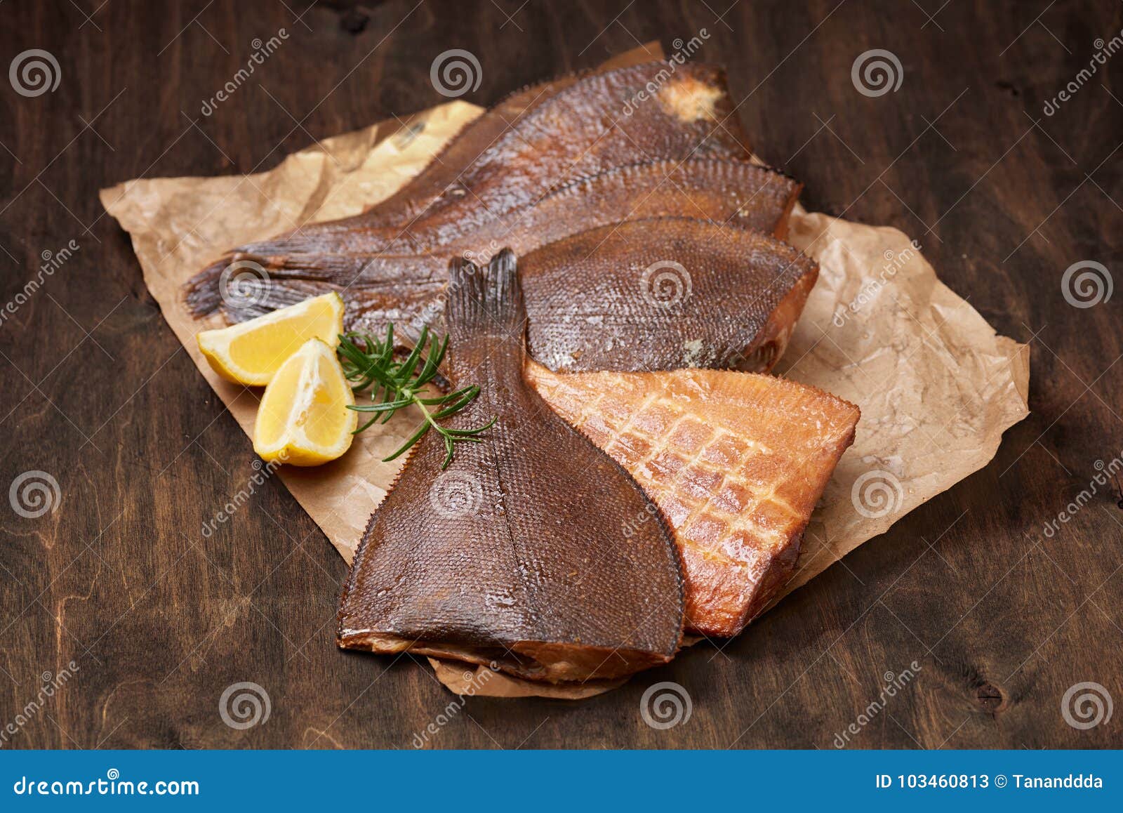 hot smoked beheaded flounder on the crumpled paper