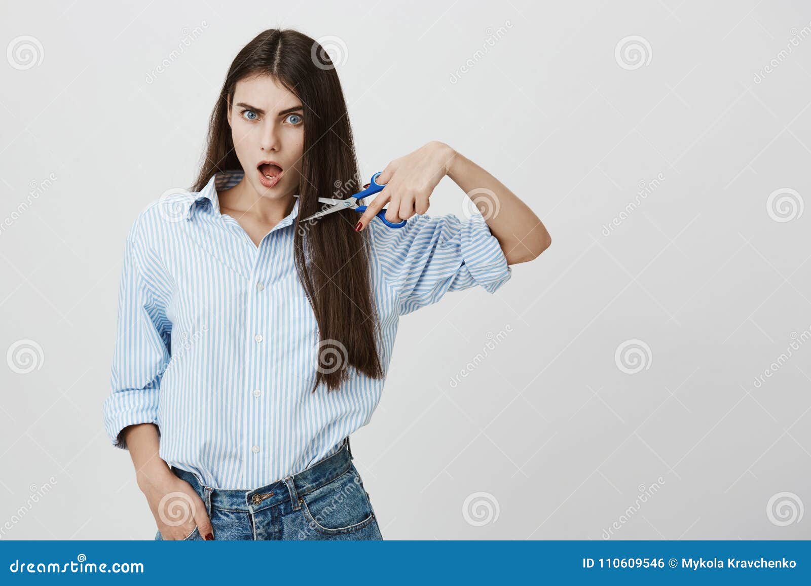 Hot And Stylish Caucasian Female Hairdresser Holding Scissors Near