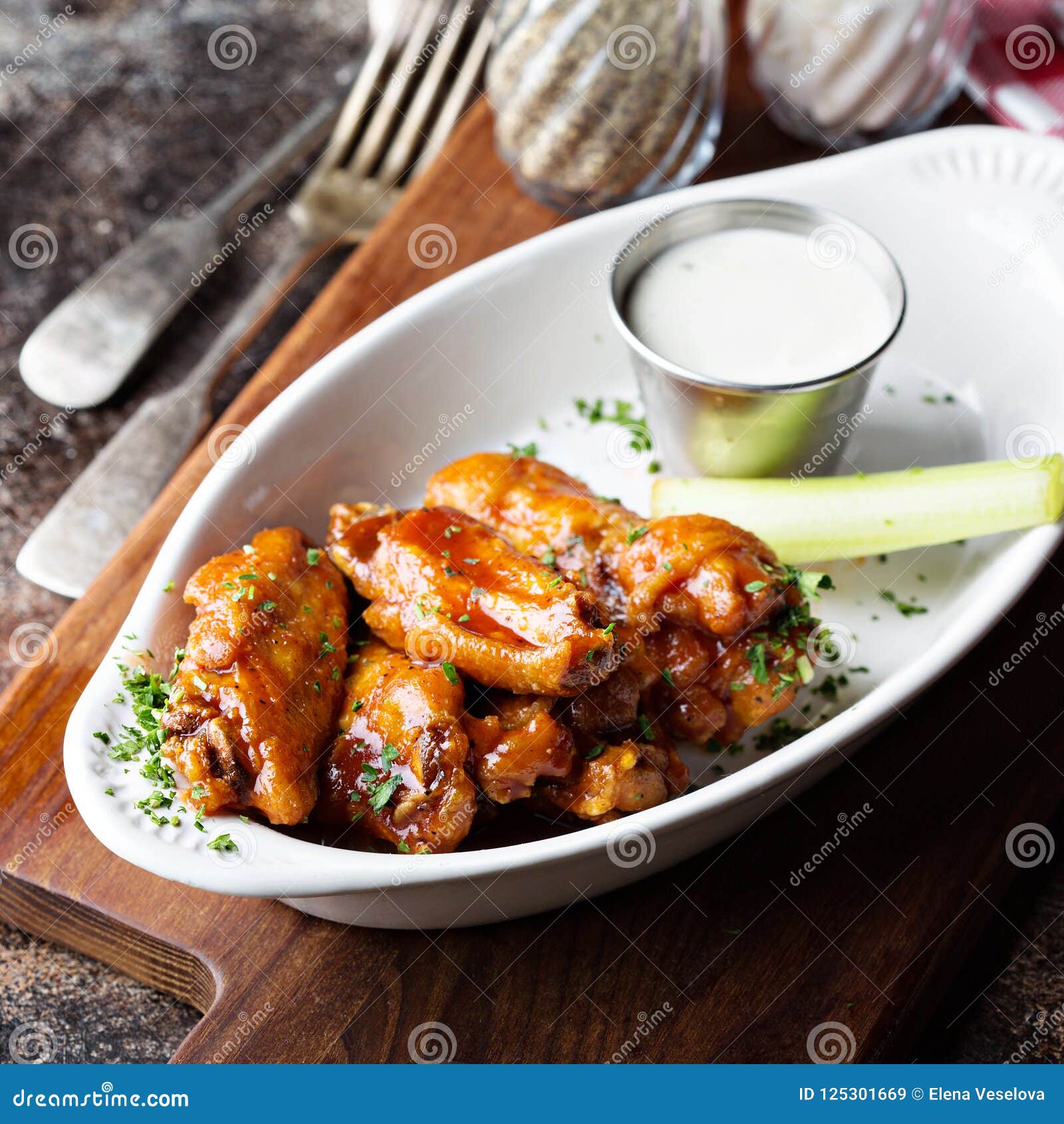 Hot wings with bbq sauce stock image. Image of crispy 125301669
