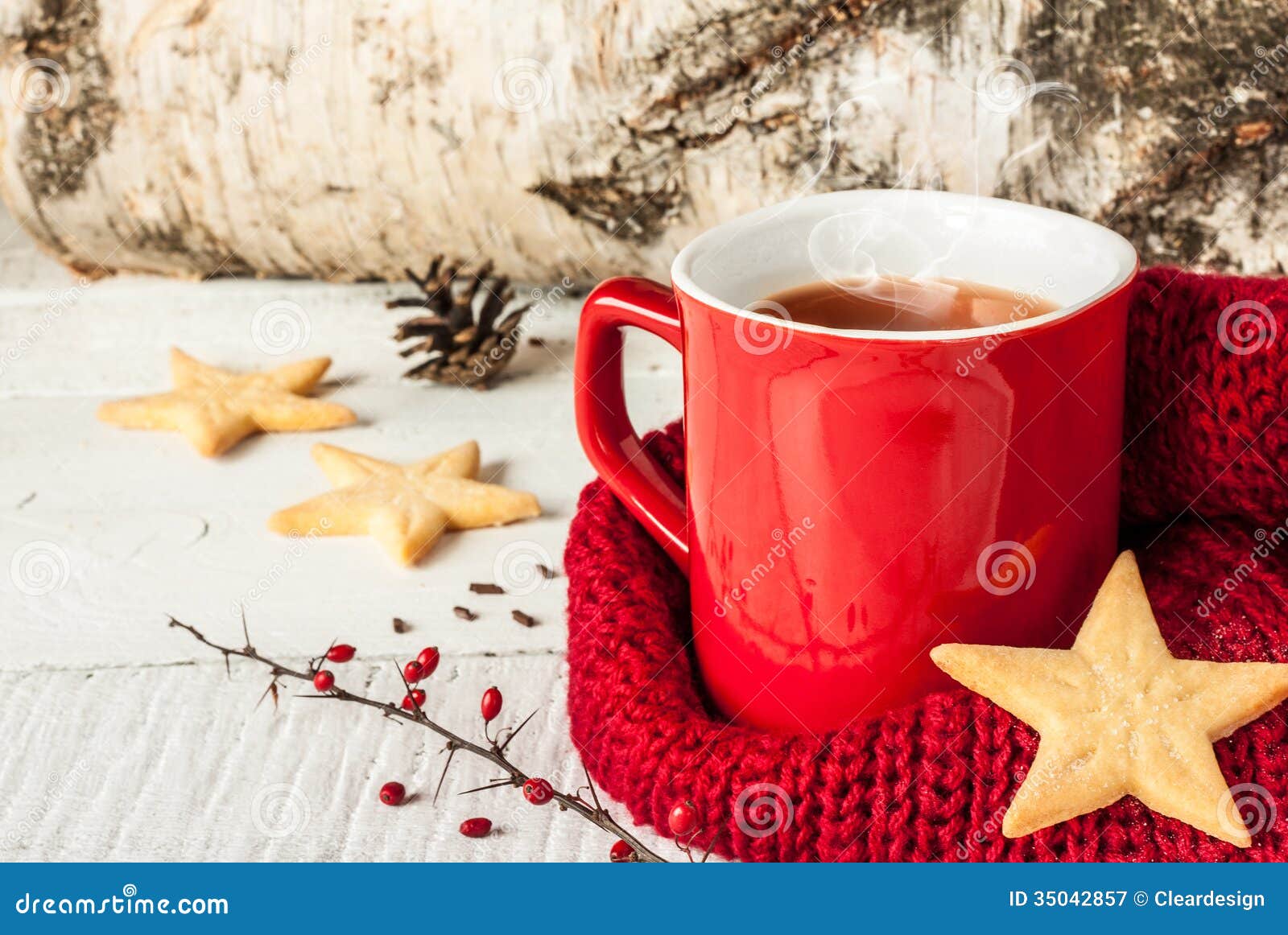 Red mug with hot coffee or tea drink on snow in winter Stock Photo by  molenira