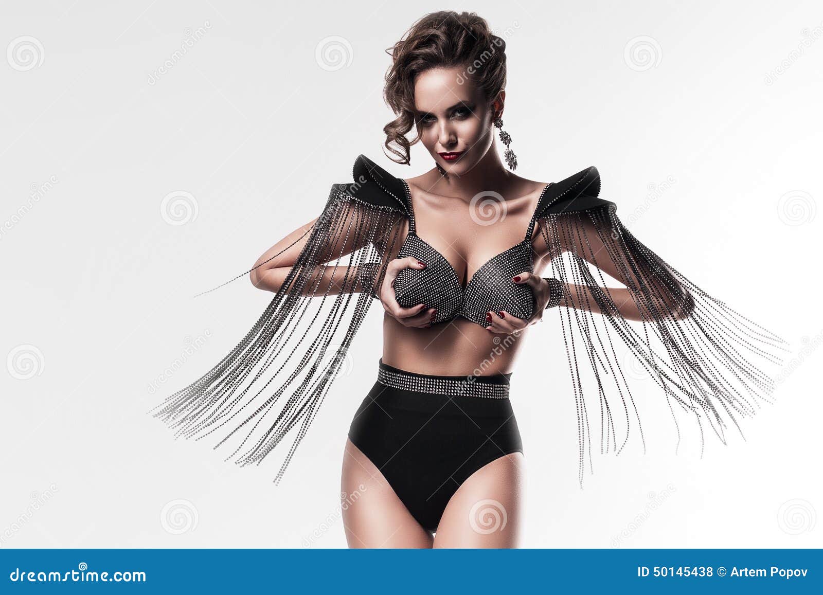 Hot Woman Holding Breasts in Cone Bra Stock Photo - Image of